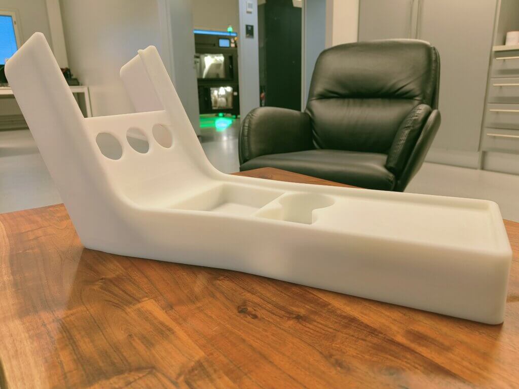 Automotive Center Console prototype printed with ABS. Size 550 x 250 x 200mm. Printing time 24hr. Weight 1,8kg